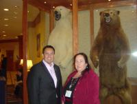 Mellor Willie, left, and Cheryl Causley, executive director and chair respectively of the National American Indian Housing Council, may have posed in front of bears during the group’s recent annual meeting in Alaska, but the outlook for Native housing isn’t totally bearish. (By Mark Fogarty)